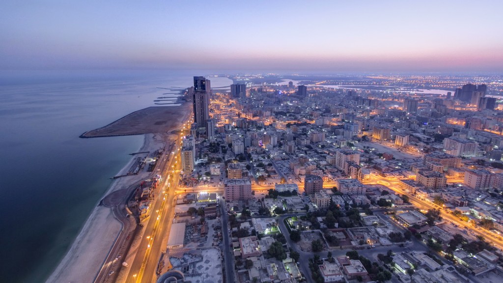 Cityscape,Of,Ajman,From,Rooftop,From,Night,To,Day,Transition